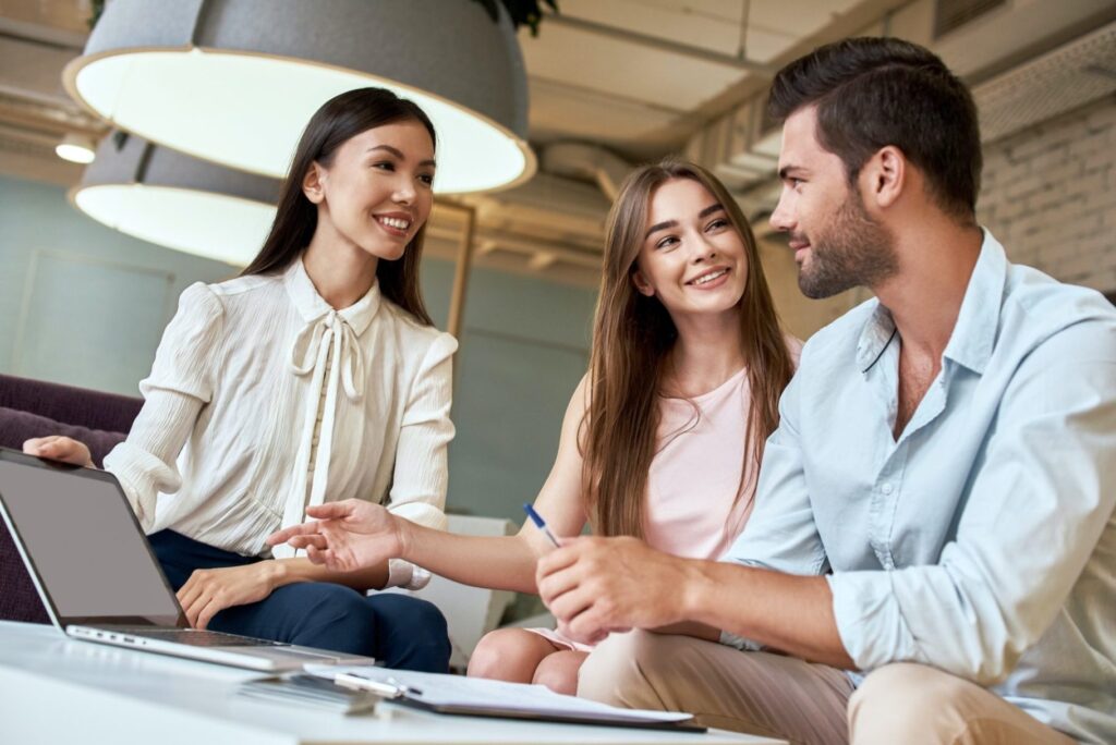 A family reviews a term life insurance policy in their home.